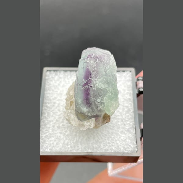 Small purple and pale green banded fluorite from Zhejiang — alternate view