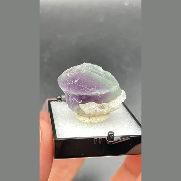 Small purple and pale green banded fluorite from Zhejiang — detail view