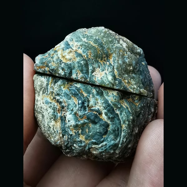 Matched pair of Brazilian agate geode halves — detail view