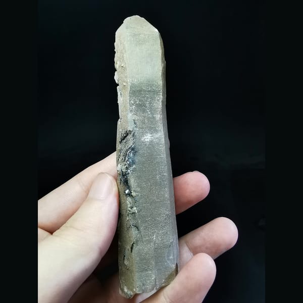 Large grey quartz with white calcite balls and hematite — alternate view