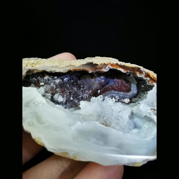 Red and white Brazilian agate geode with lid — alternate view