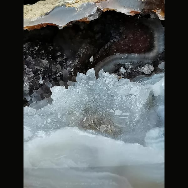 Red and white Brazilian agate geode with lid — alternate view