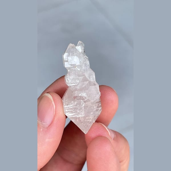 Clear quartz crystal with an unusual irregular form from Yunnan — detail view
