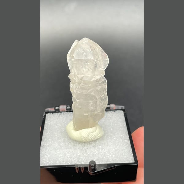 Clear quartz crystal with a sceptre-like stepped form from Yunnan — detail view