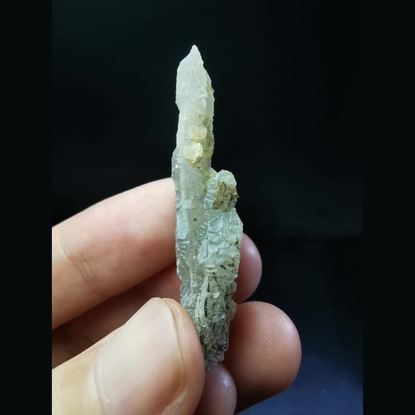 Flat quartz crystal with yellow calcite plates — alternate view