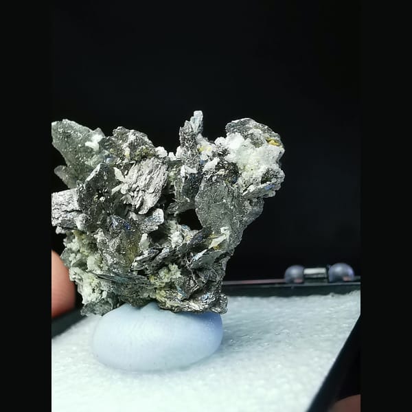Wing-like platy loellingite crystal cluster — alternate view