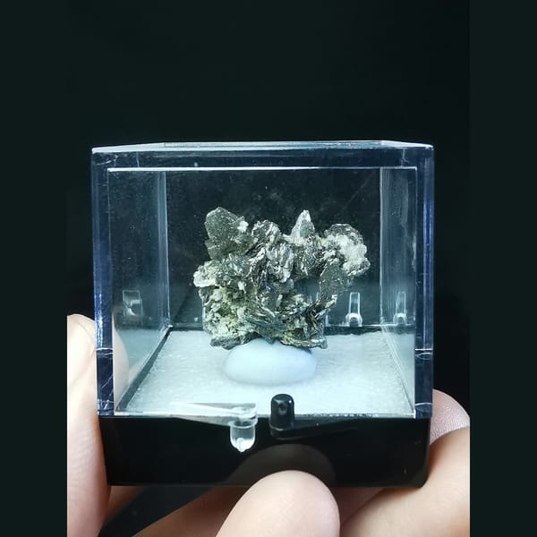 Wing-like platy loellingite crystal cluster — detail view