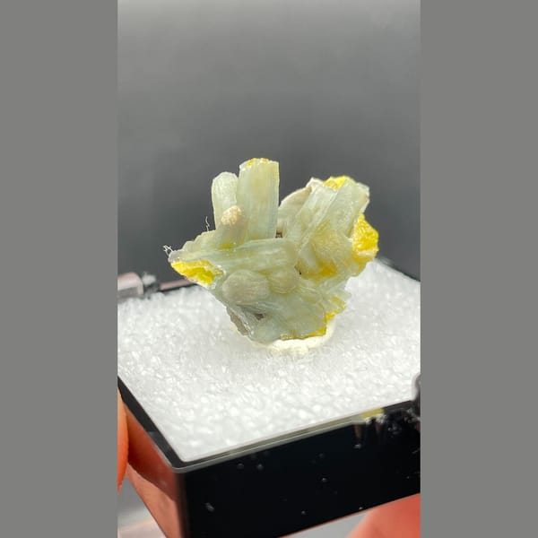 Yellow-green plumbogummite crystals with bright yellow tips from Guangxi — detail view
