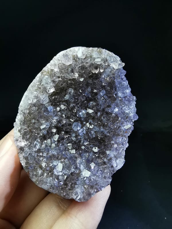 Complete upright view of the exact Uruguayan pale amethyst druzy crescent