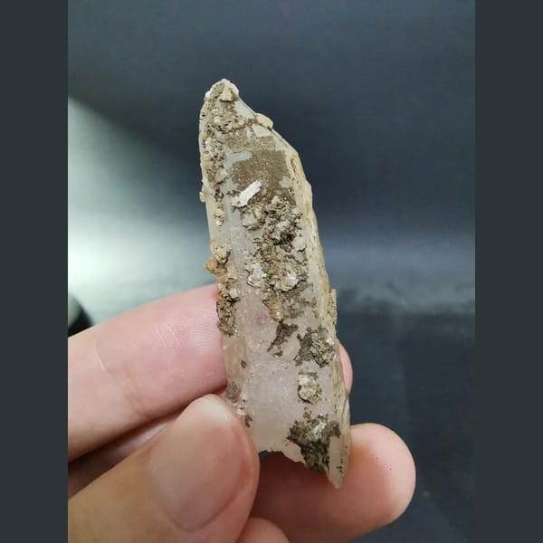 Pale pink floater quartz with calcite — complete view