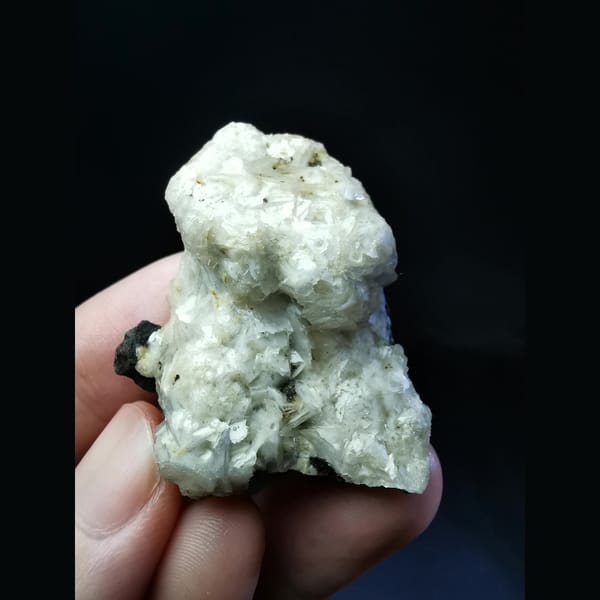 Garnet covered with white calcite — alternate view