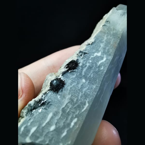 Sparkling quartz with hematite balls and calcite — detail view