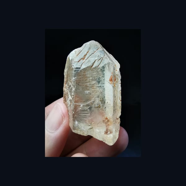 Complete front view of the exact Madagascar blue-needle quartz point