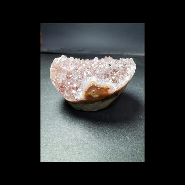 Pink-purple amethyst druze shaped as a cake cup from Uruguay — detail view