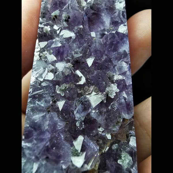 Polished Uruguayan amethyst tower with crystal flowers — alternate view
