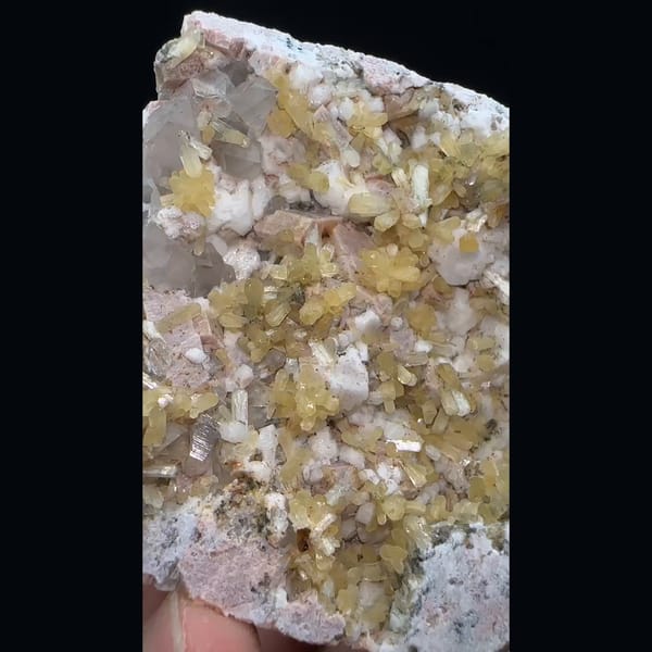 Yellow stilbite sprays with feldspar and quartz on a plate from Yunxiao, Fujian — alternate view