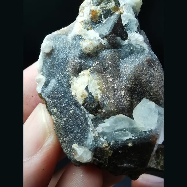 Sugar-coated garnet with white calcite — alternate view