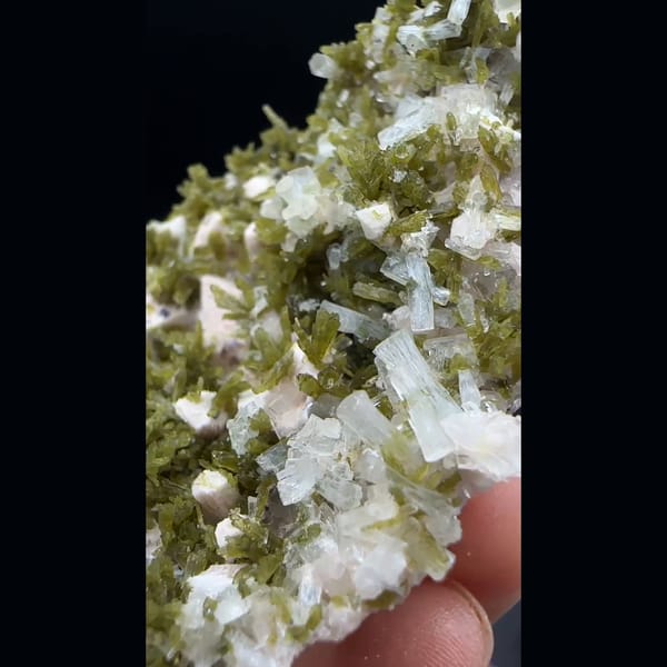 White laumontite with olive epidote and pink feldspar from Yunxiao, Fujian — alternate view