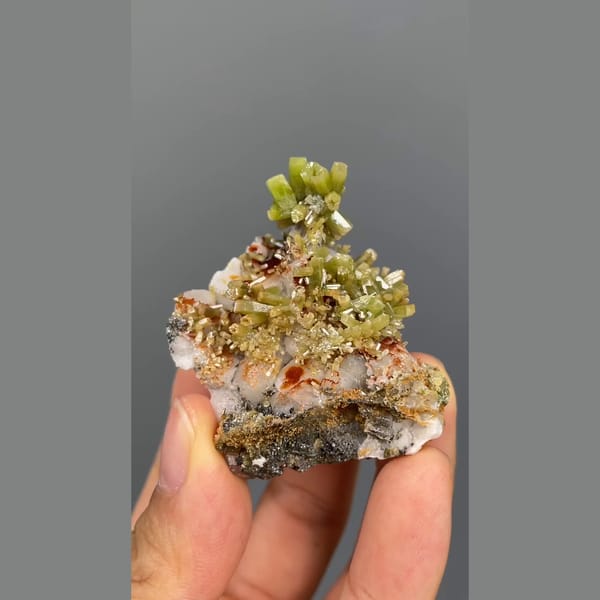 Bright green barrel-shaped pyromorphite crystals from Yangjiang, Guangdong — complete view