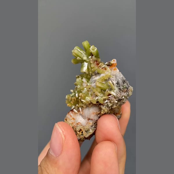 Bright green barrel-shaped pyromorphite crystals from Yangjiang, Guangdong — alternate view