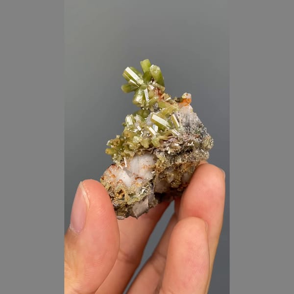 Bright green barrel-shaped pyromorphite crystals from Yangjiang, Guangdong — alternate view