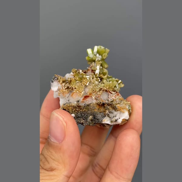 Bright green barrel-shaped pyromorphite crystals from Yangjiang, Guangdong — detail view