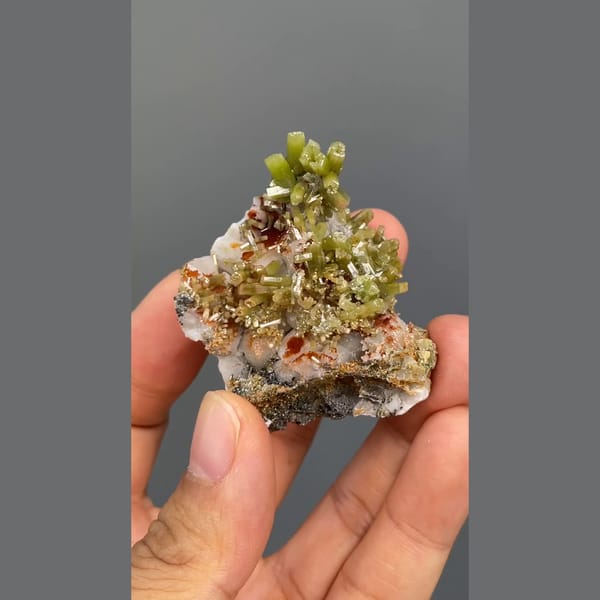 Bright green barrel-shaped pyromorphite crystals from Yangjiang, Guangdong — detail view