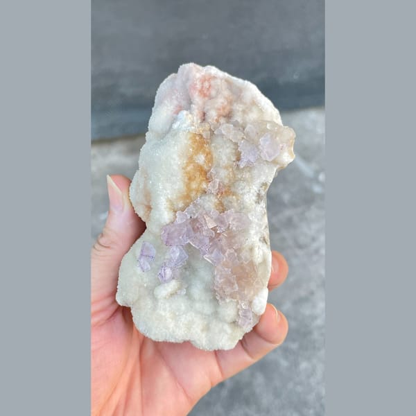 Large pale pink and white fluorite from Guizhou — detail view