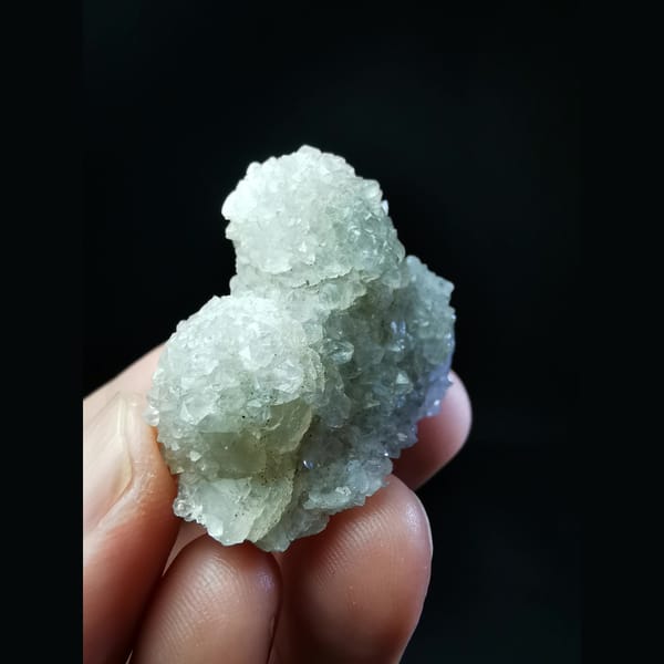 Sparkling quartz balls encasing calcite — alternate view