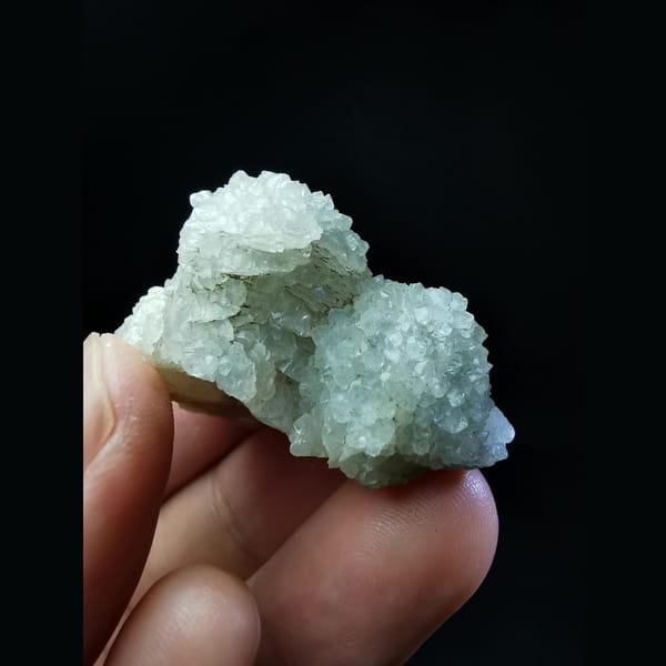 Sparkling quartz balls encasing calcite — alternate view