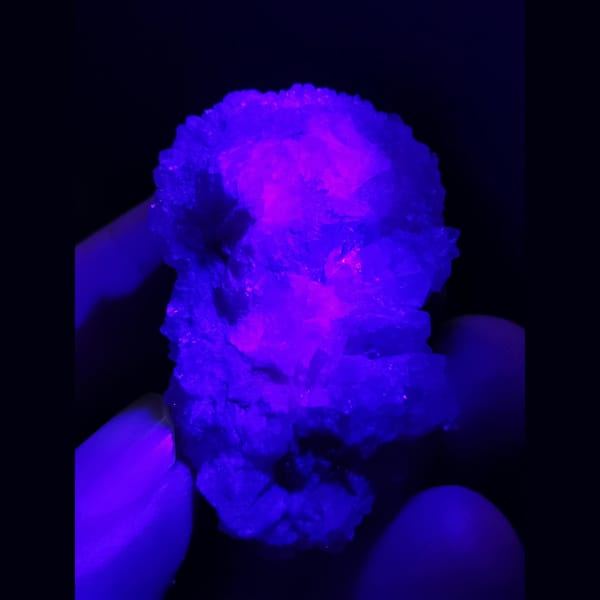 Sparkling quartz balls encasing calcite — detail view