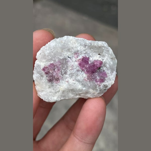 Rough red ruby corundum crystals in white matrix from Yunnan — alternate view