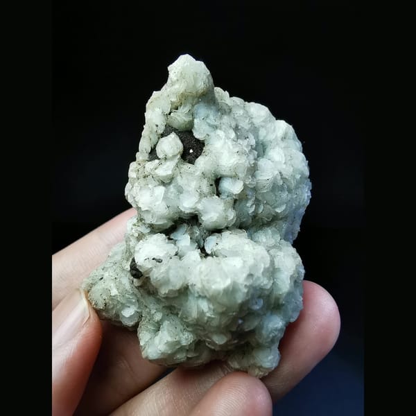 White calcite flowers on quartz — alternate view