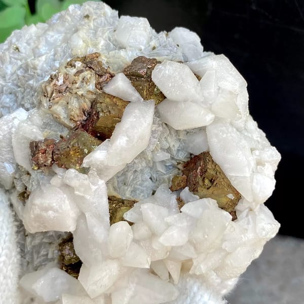 White calcite with brassy pyrite — detail view