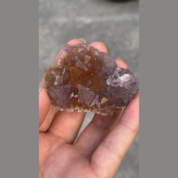 Rose purple transparent fluorite cluster from Zhejiang — complete view