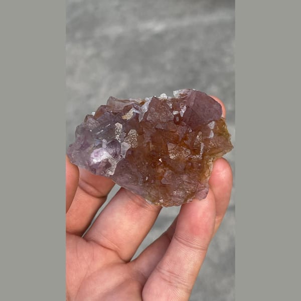 Rose purple transparent fluorite cluster from Zhejiang — detail view