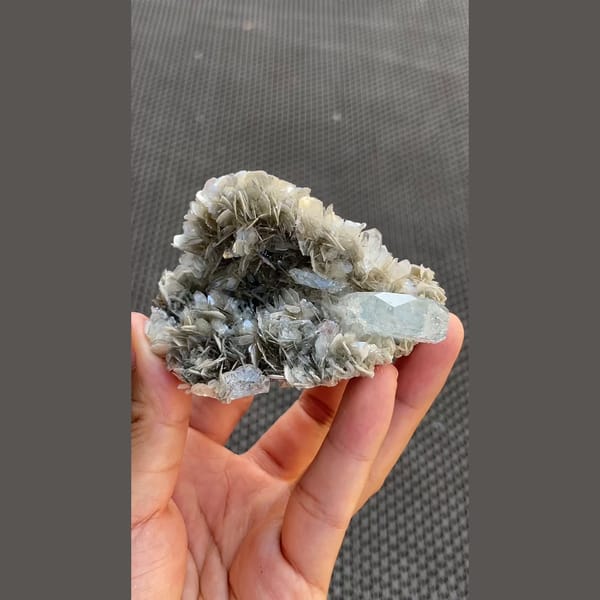 Pale blue aquamarine crystals on silvery mica from Xuebaoding, Sichuan — alternate view