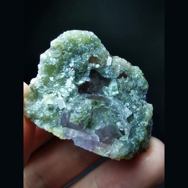 Icy fluorite on mica matrix — complete view