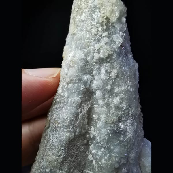 Floater quartz with a thin calcite coat — alternate view