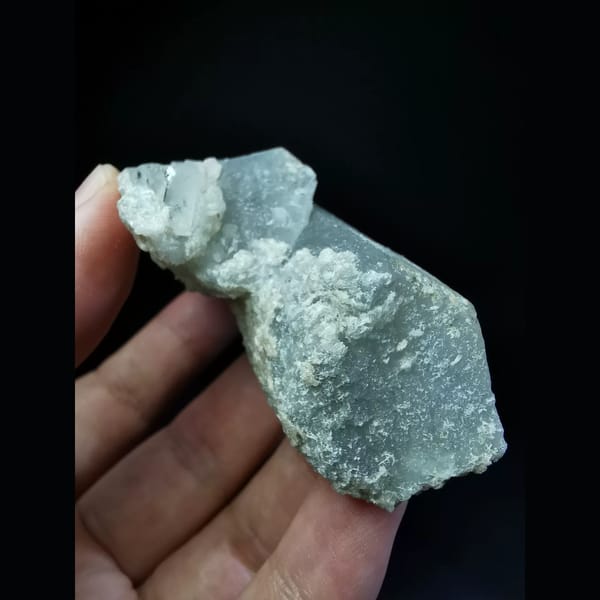 Floater quartz with a thin calcite coat — detail view