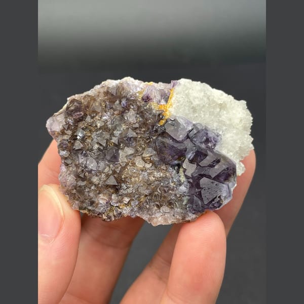 Deep purple fluorite cubes on brown matrix from Inner Mongolia — complete view