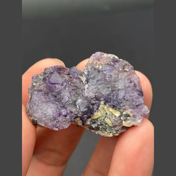Small cluster of purple fluorite cubes from Inner Mongolia — alternate view