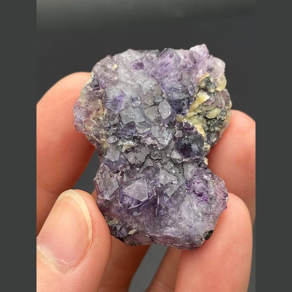 Small cluster of purple fluorite cubes from Inner Mongolia — alternate view