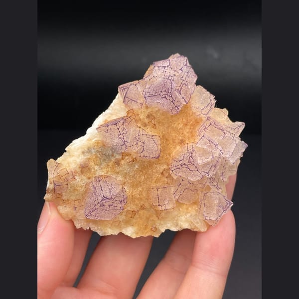 Pink lavender fluorite plate with patterned orange coating from Guizhou — alternate view