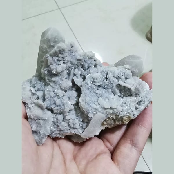 Quartz cluster with sparkling white calcite plates — alternate view