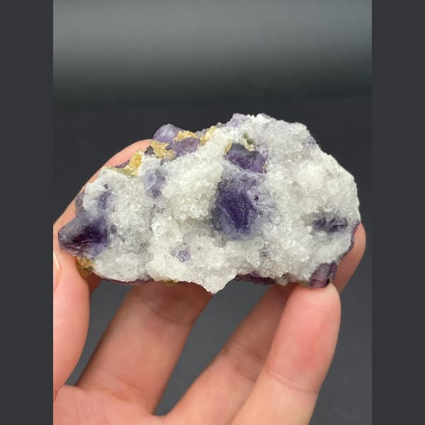 Deep purple fluorite cubes in white quartz from Inner Mongolia — complete view