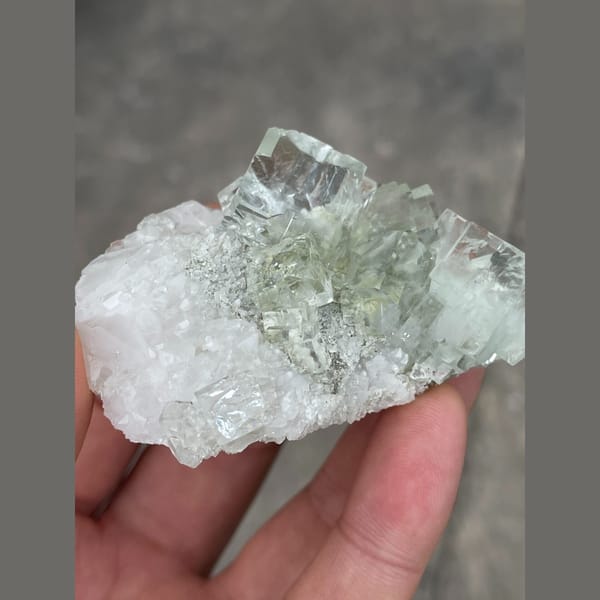 Clear mint green fluorite on white matrix from Xianghuapu — alternate view