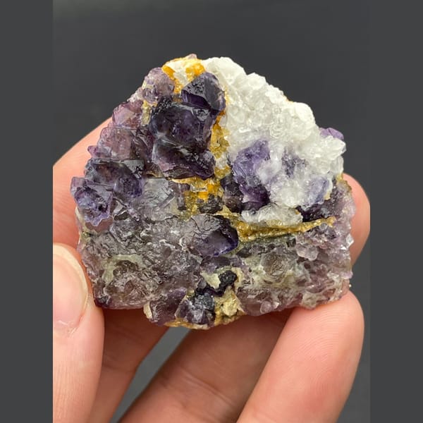 Purple fluorite cubes with golden accents from Inner Mongolia — alternate view