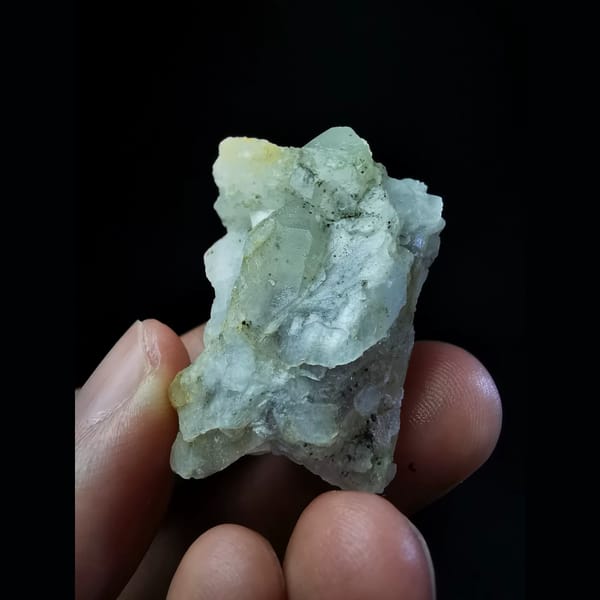 Slightly purple calcite-interference quartz — alternate view