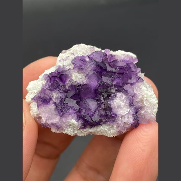Deep purple fluorite cubes on white matrix from Inner Mongolia — complete view